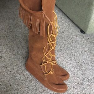 Knee high Minnetonka boots